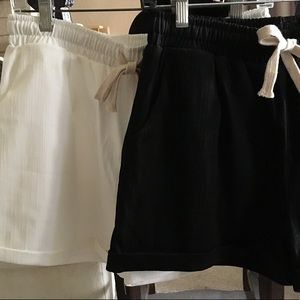 Shorts- 1 pair Black, 1 pair White